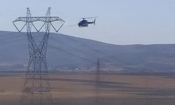 Helikopterin yüksek gerilim hattına takıldığı ihbarı ekipleri alarma geçirdi